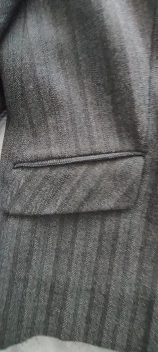 Traje de chaqueta y pantalón gris señora