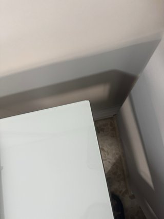 Mesa de cocina extensible gris y blanca