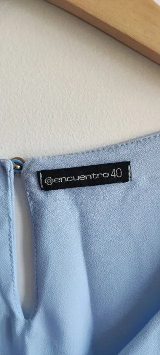 Blusa azul sin mangas