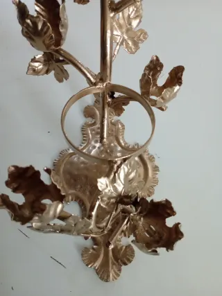 Portabottiglie decorativo in metallo dorato