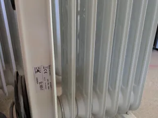 Tres Radiadores Aceite Eléctrico Plata y Blanco.