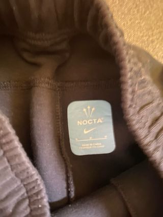 Chándal Nike NOCTA Negro y Dorado