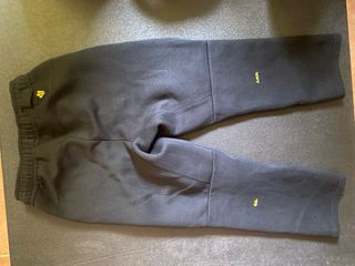 Chándal Nike NOCTA Negro y Dorado