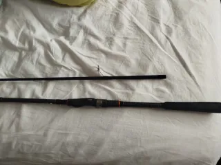 Caña de pescar giratoria con carrete