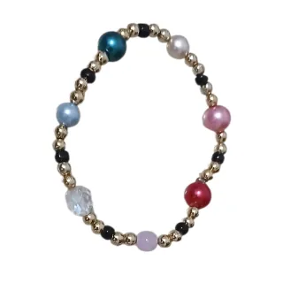 Pulsera de cuentas doradas y multicolor