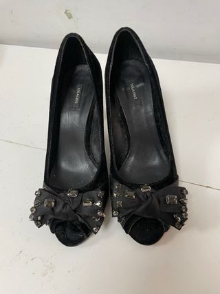 Zapatos de tacón Pitillos azul marino 10€ cada par