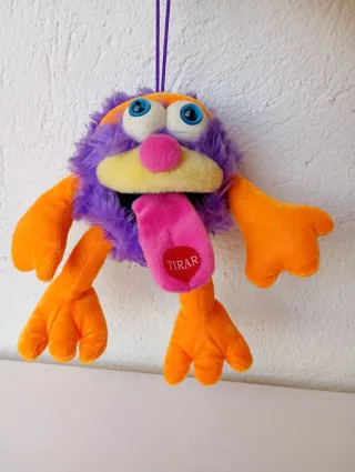 Peluche divertido morado y naranja