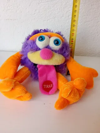 Peluche divertido morado y naranja