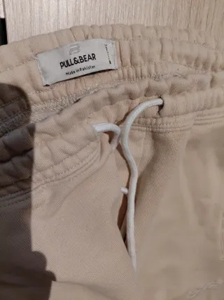 Pantalones de chándal beige y negro