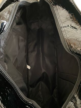 Bolsa de viaje negra efecto piel