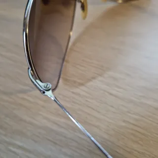 Gafas de sol Ray-Ban marrones y plateadas