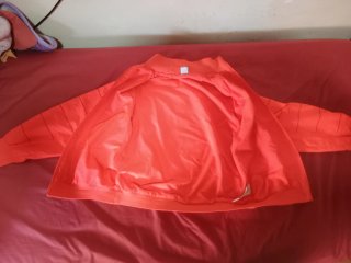 Chaqueta FC Barcelona Nike naranja.