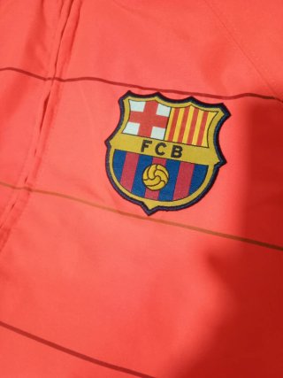 Chaqueta FC Barcelona Nike naranja.