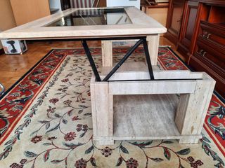 Mesa de centro de piedra y cristal