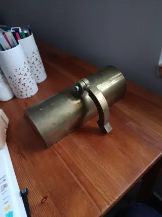 Pieza de lámpara de bronce
