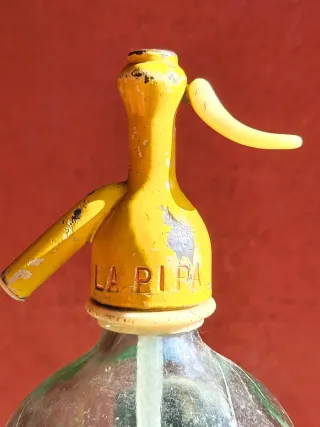 Sifón antiguo labrado Gijón cabeza plomo