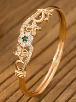 Bracciale rigido vintage oro con fiore