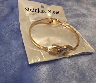 Pulsera de acero dorada con ositos