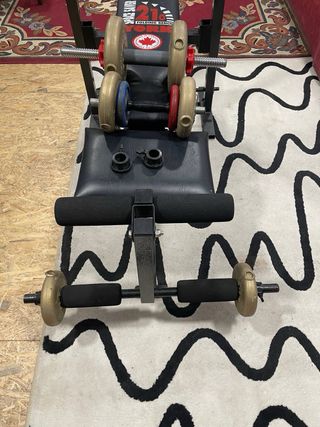 Banco de pesas York + barra + mancuernas + discos