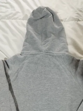 Sudadera Nike gris con logo rosa capucha talla S