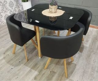 Mesa cristal templado y 4 sillas negras