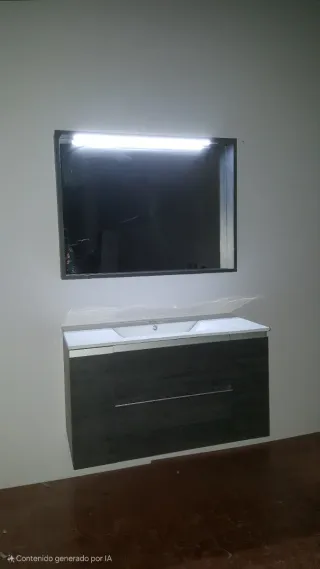 Mueble de baño de 100cm con espejo y lavabo.