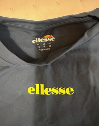 Conjunto deportivo Ellesse azul y amarillo
