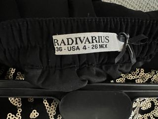 Falda corta negra con lentejuela talla 36