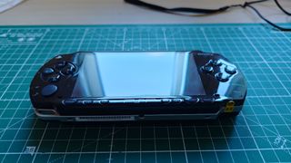 PSP 1004 Gigapack Negra + 3 juegos