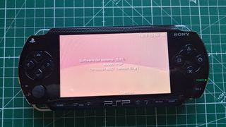 PSP 1004 Gigapack Negra + 3 juegos