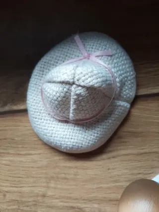 Muñeca bebé con vestido rosa