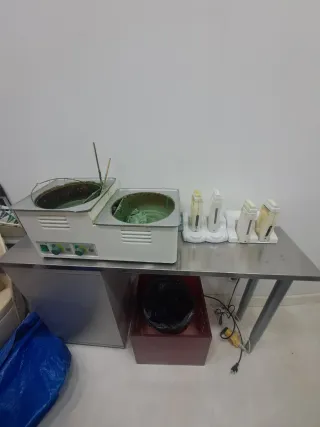 Máquina y cartuchos de cera depilatoria