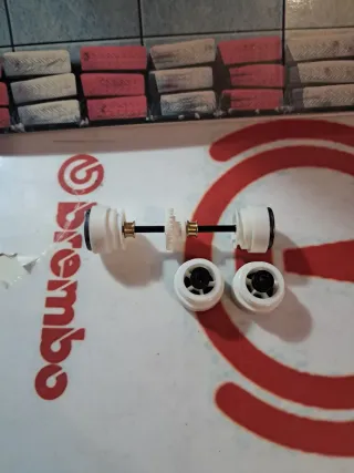 EJE Y SEMIEJES DE SCALEXTRIC LLANTA NEGRA