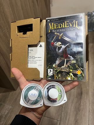 Console PSP con fotocamera + 5 giochi e UMD del film, God of War