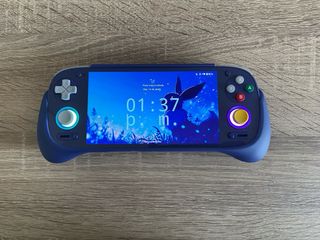 Retroid Pocket 5 OLED Viola con scatola + Grip + Cavo