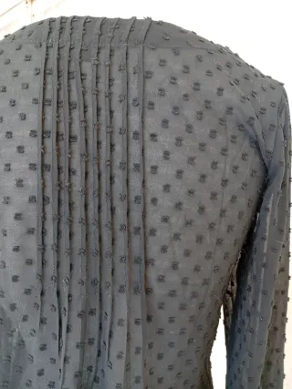 Blusa plumeti manga larga negra
