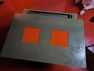 Mesa de comedor elevable gris y naranja