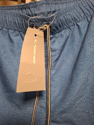Pantalón corto deportivo azul