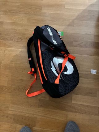 Raquetero de pádel negro y naranja