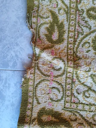 Alfombra decorativa verde y rosa