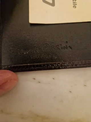 Portafoglio nero effetto pitone