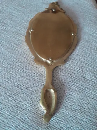 Espejo de mano de bronce