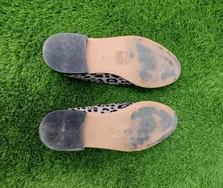 Mocasines animal print beige y negro