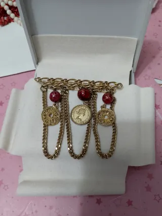 Spilla vintage con monete oro e perle rosse