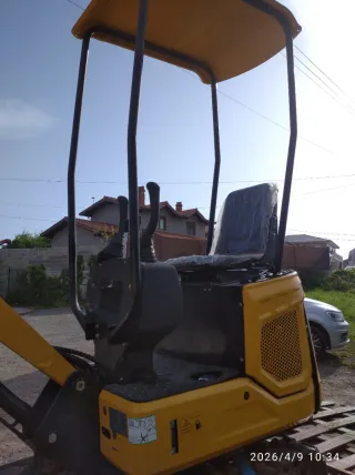 Mini retroexcavadora orugas de goma