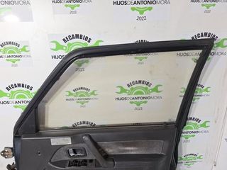 Puerta delantera derecha mitsubishi montero 99295