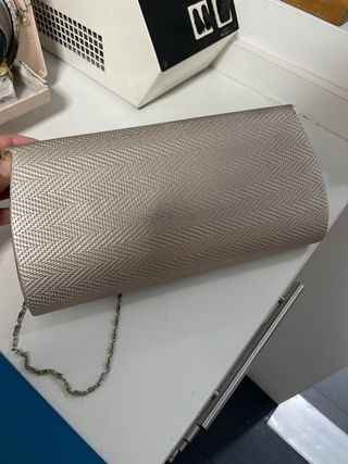 Bolso de fiesta dorado y plateado