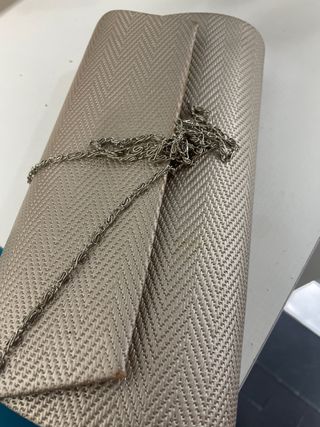 Bolso de fiesta dorado y plateado