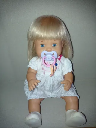 Muñeca Nenuco rubia ojos azules.