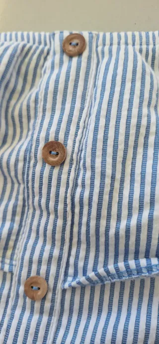 Blusa escote volante rayas azul